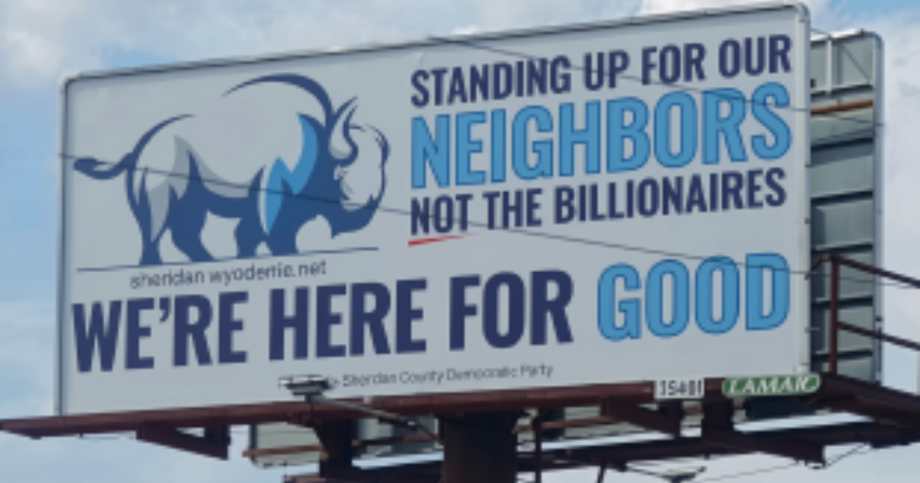 billboard that reads standing up for our neighbors, not the billionaires. below that is We're Here For Good. Top left is a posterized illustration of bison with sheridan.wyodems.net as caption.